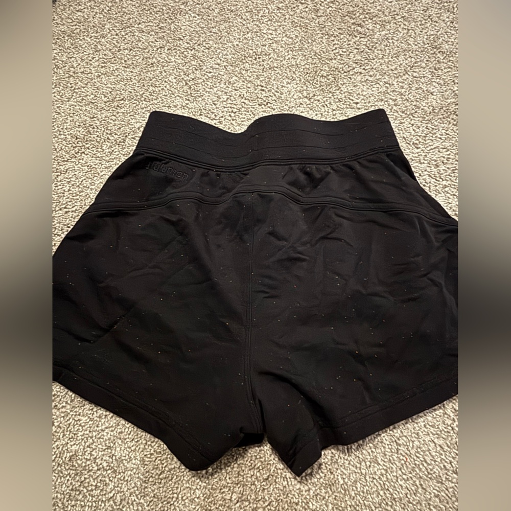 Lululemon black shorts .